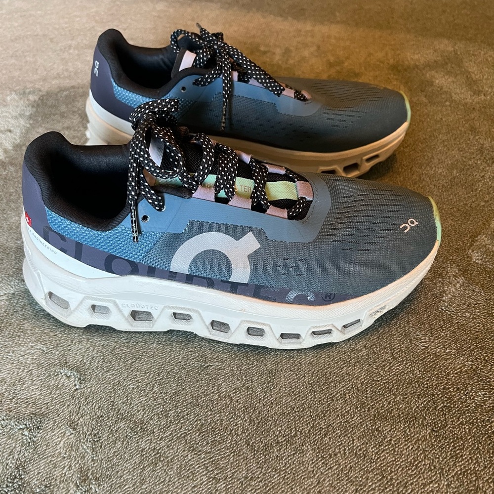 On Running Gray and Black Athletic Shoes